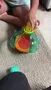 Bright Starts Spin n Chase Bug Ballspielzeug mit Licht