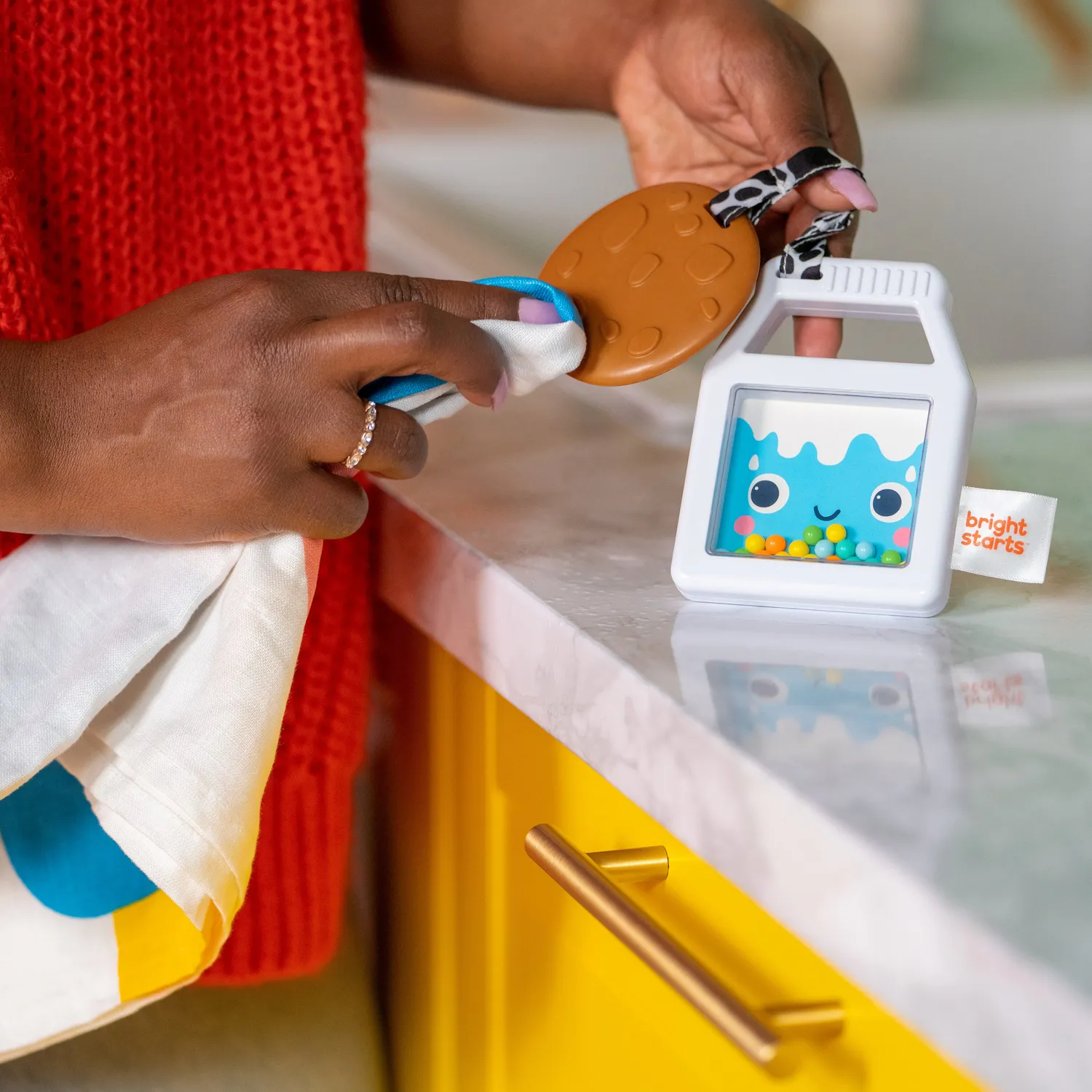 Bright Starts Cookies & Teethe Rassel und Beißring 2-in-1