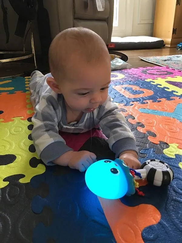 Baby Einstein Ocean Glow Sensory Shaker Rassel mit Licht