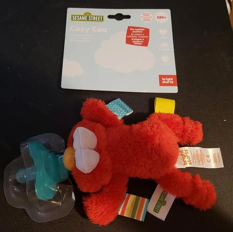 Sesame Street Cozy Coo Elmo Schnuller mit Plüsch BPA-frei