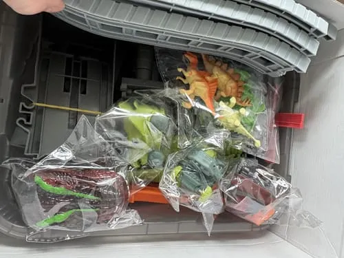 TUMAMA Dinosaurier Rennbahn Set Dino-Autos mit Licht