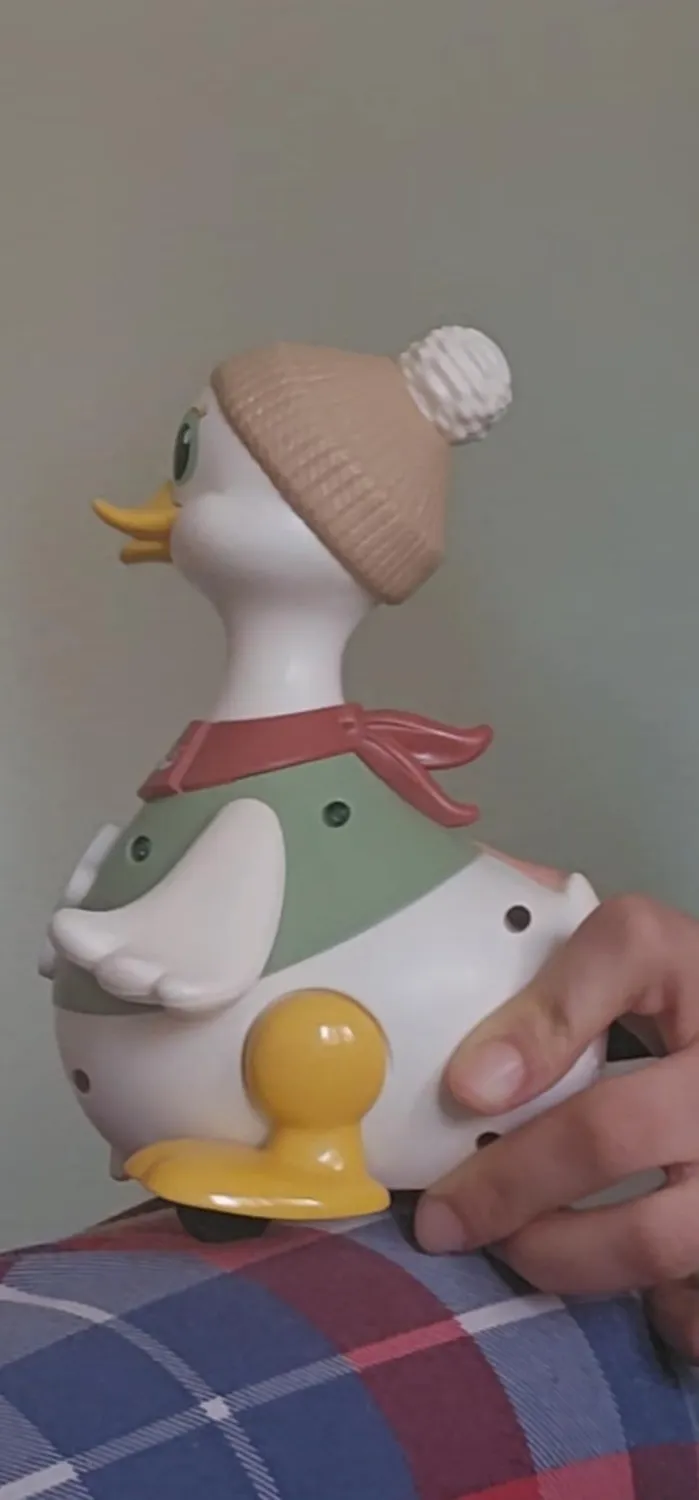 HOLA Dancing Duck Krabbelspielzeug mit Licht und Musik