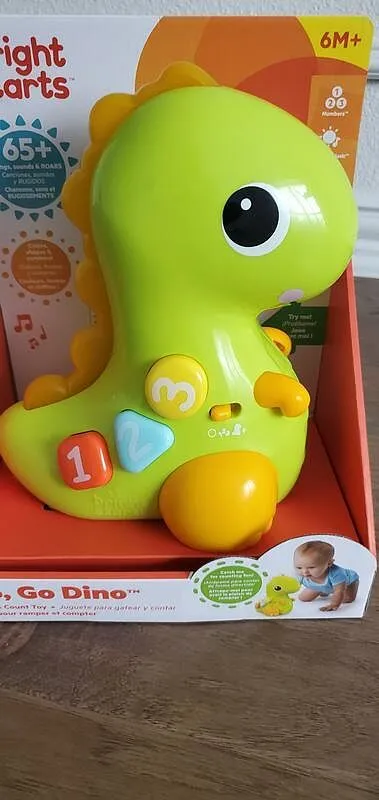 Bright Starts Go Go Dino Krabbelspielzeug Licht Musik