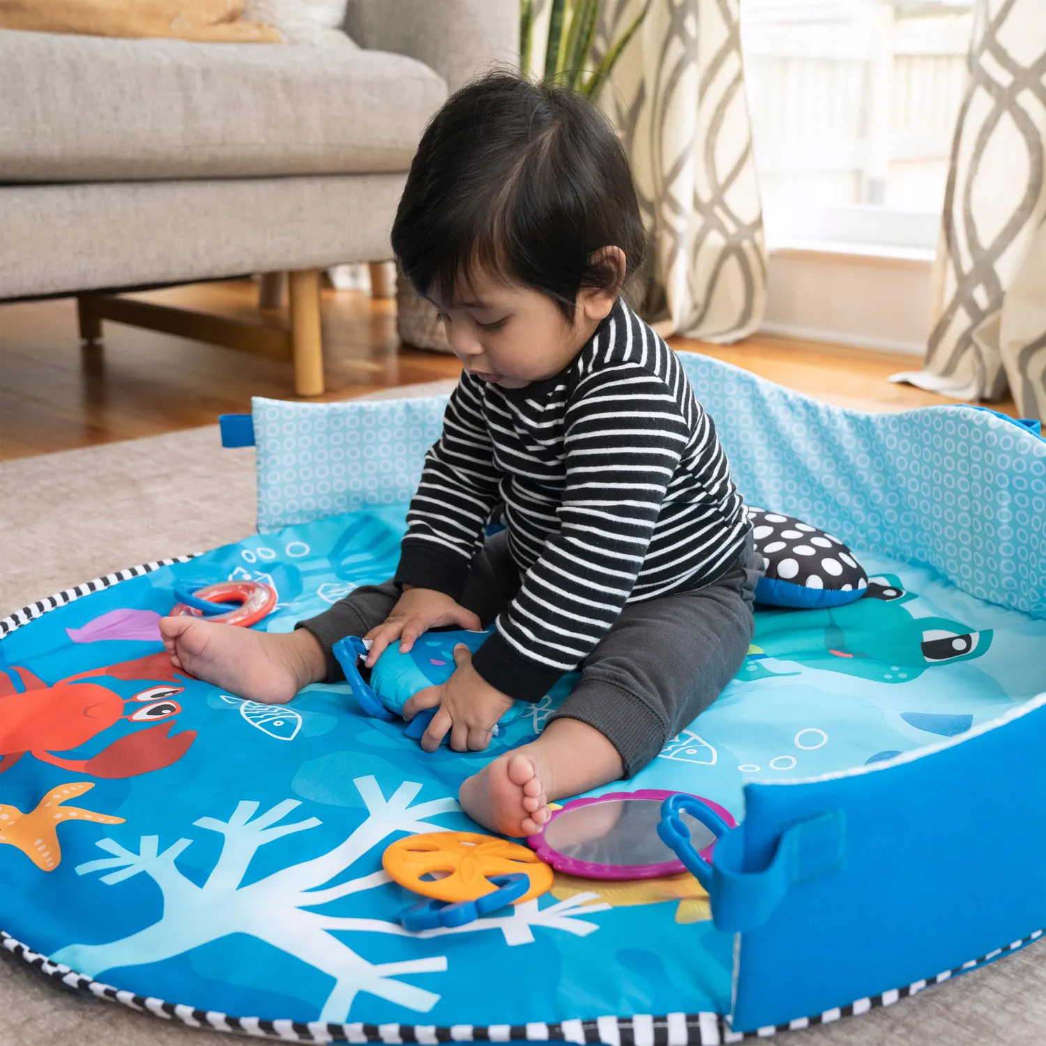 Baby Einstein Neptune Spielbogen Unterwasser mit Musik
