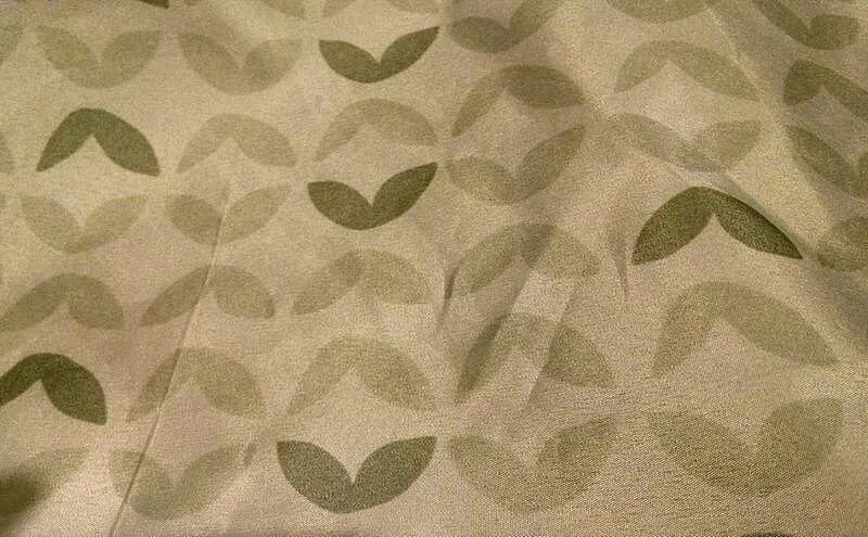Ity by Ingenuity Snuggity Snug Beistellbett Nimbu Rollen