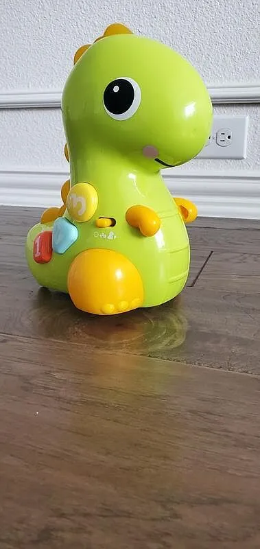 Bright Starts Go Go Dino Krabbelspielzeug Licht Musik
