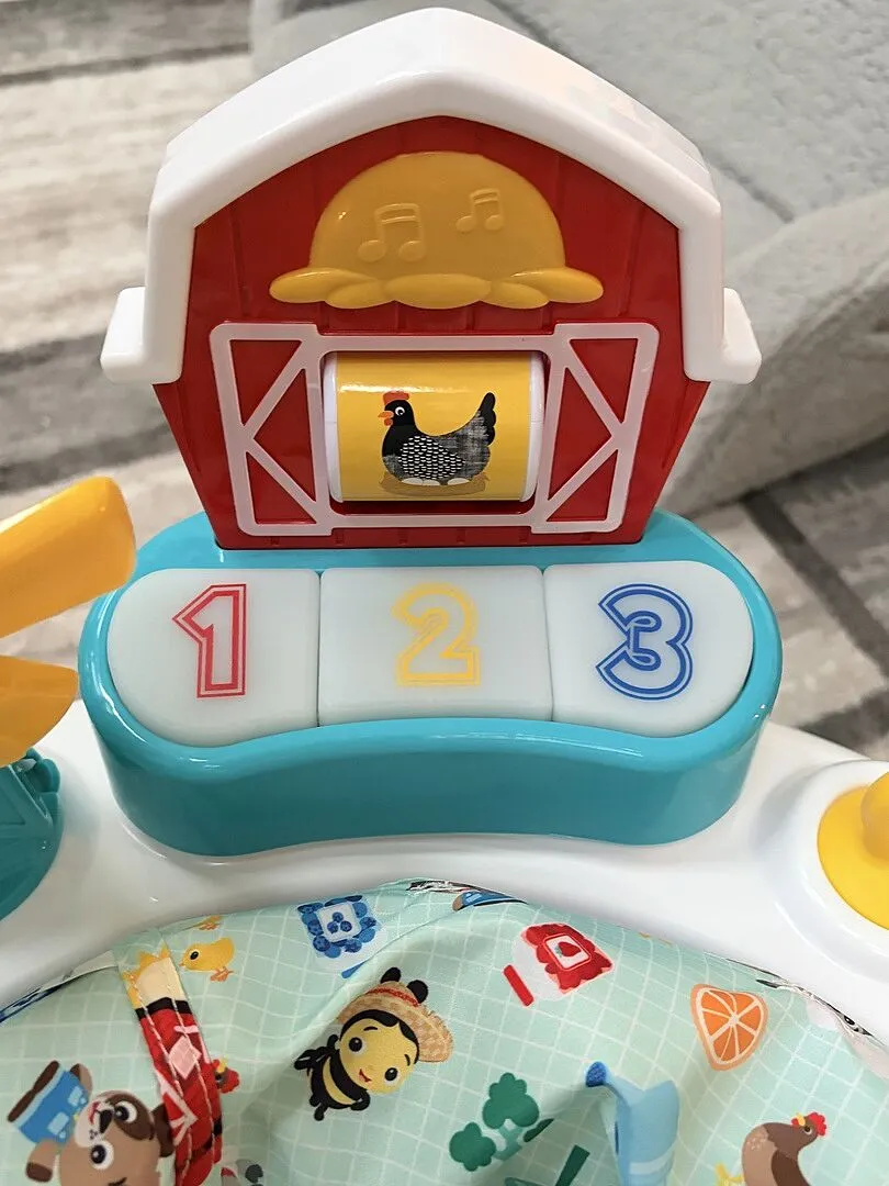 Baby Einstein Farm Explorers Barnyard Jumper 2-in-1 mit Klavier