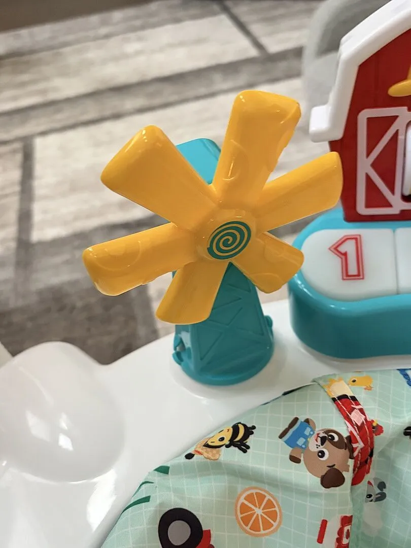 Baby Einstein Farm Explorers Barnyard Jumper 2-in-1 mit Klavier