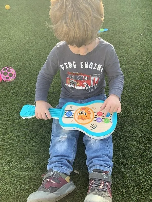Baby Einstein Sing & Strum Magic Touch Ukulele Holz 6-36M