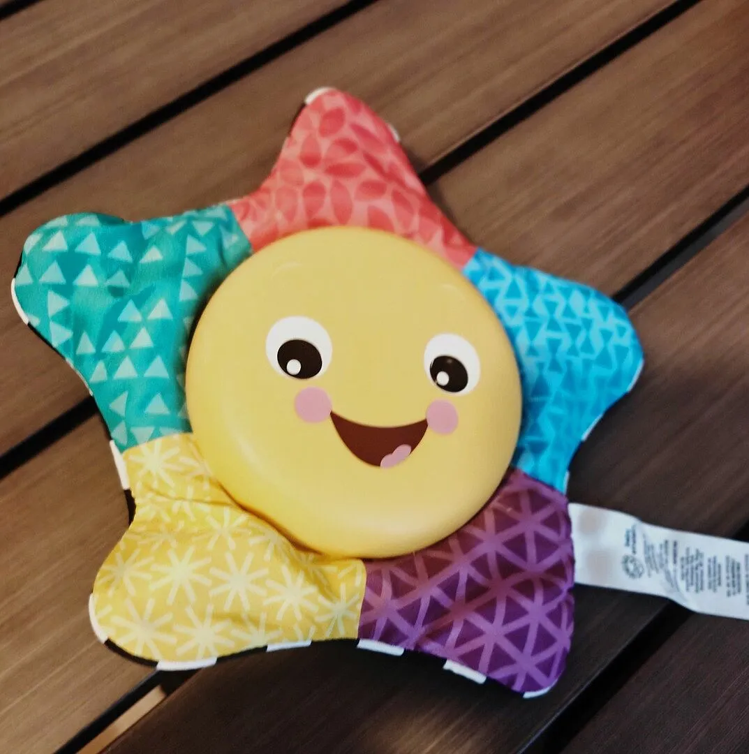 Baby Einstein Star Bright Symphony Stern Plüschtier mit Musik