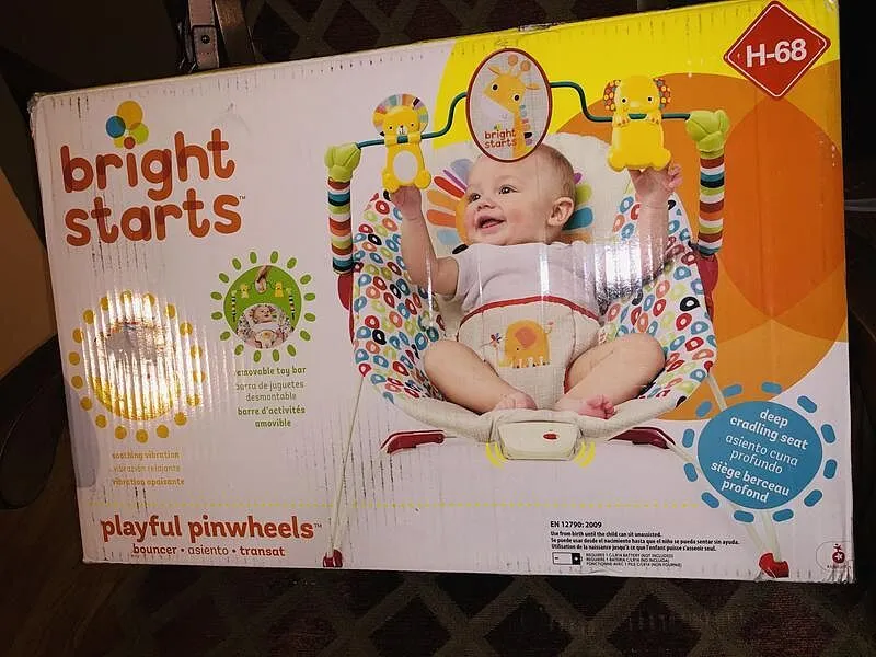 Bright Starts Playful Pinwheels Babywippe Vibration Spielbügel