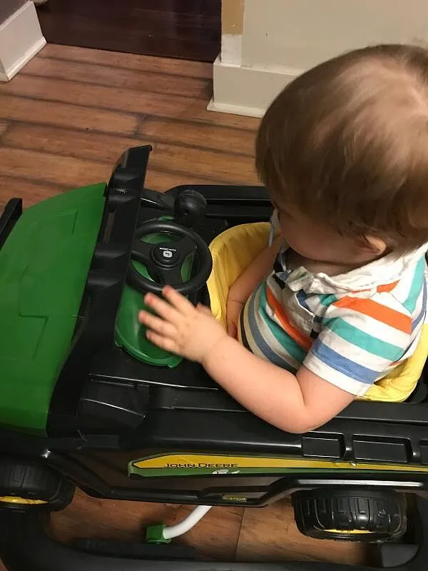 Bright Starts John Deere Gator Lauflernwagen 4-in-1 grün