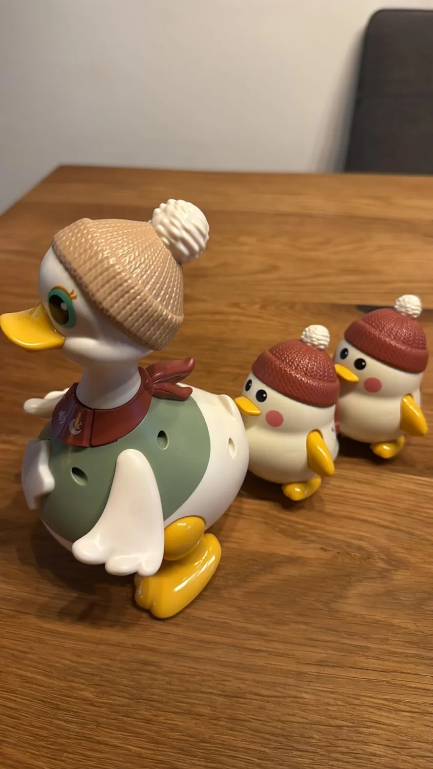 HOLA Dancing Duck Krabbelspielzeug mit Licht und Musik