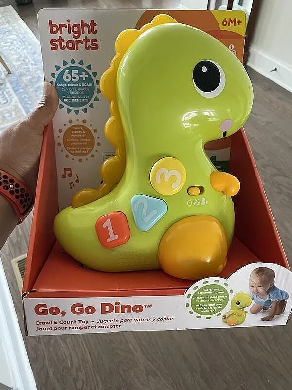Bright Starts Go Go Dino Krabbelspielzeug Licht Musik