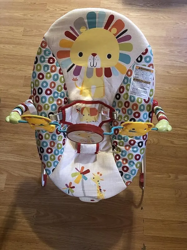Bright Starts Playful Pinwheels Babywippe Vibration Spielbügel